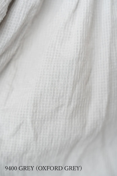 maison de soil | 80s ORGANIC MICRO CHECK OVERDYE CREW-NECK BUTTON SHIRT WITH MINI PINTUCK