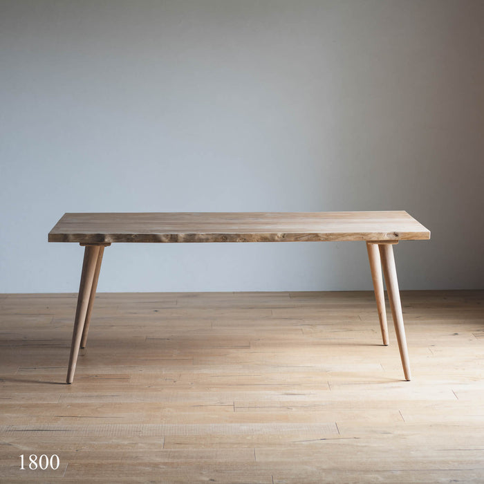 Coupe dining table