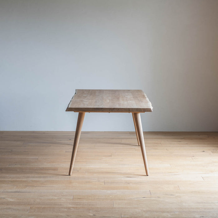 Coupe dining table
