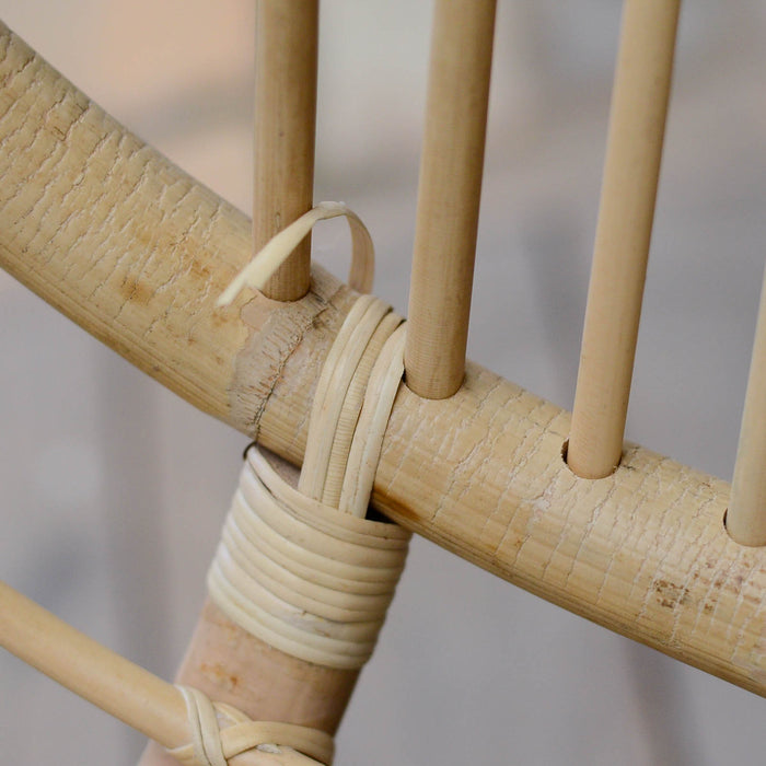 Hanging Rattan Chair A hanging chair that is wrapped in the