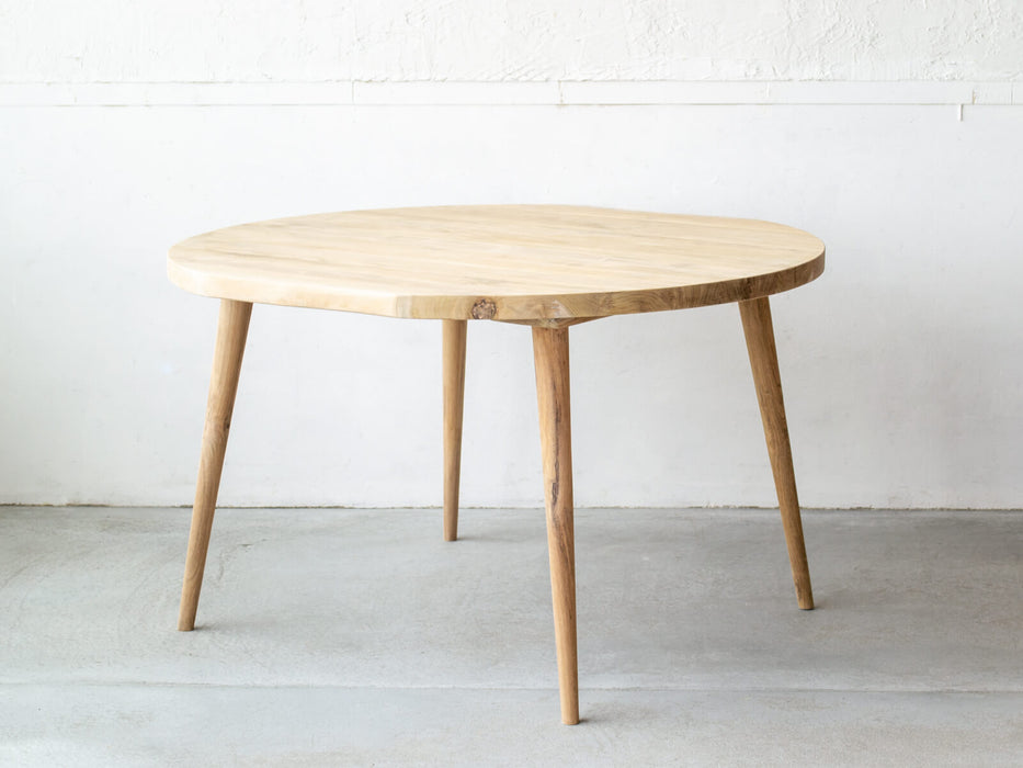 Coupe round dining table